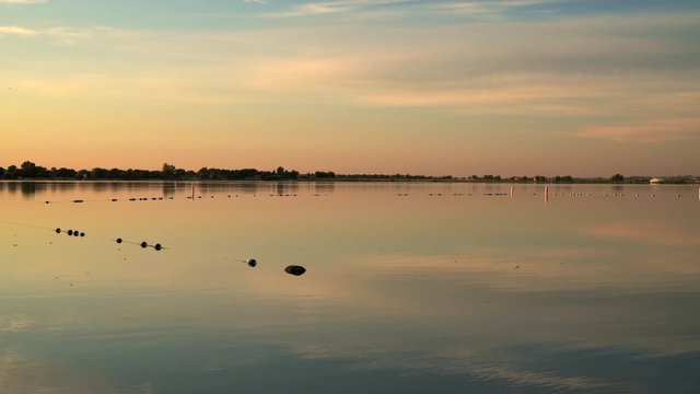 boydEarly morning on an empty swimming beach in Boyd Lake State Park in northern Colorado, calm lake with a gentle breeze-lake-beach-15