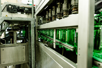 Naklejka premium Water factory - Water bottling line for processing and bottling pure spring water into small bottles.