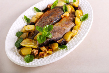 Baked rainbow trout fish with vegetables