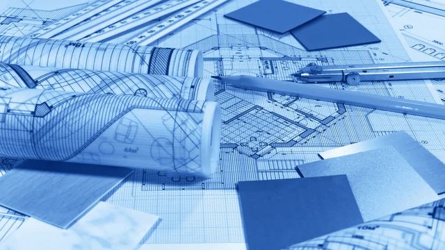 Blueprints: architectural drawings, yardstick - folding ruler & samples of modern interior decoration materials - decorative plastics smoothly rotate on the surface of the architectural plan
