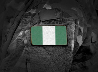 Flag of Nigeria on military uniform. Army, soldiers, Africa (collage).