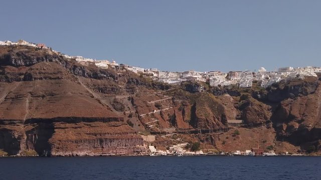 Greek islands in the Aegean. A popular tourist and cruise destination. Volcanic islands. Traditional greek architecture.