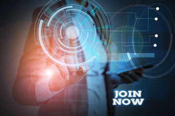 Word writing text Join Now. Business photo showcasing An invite to a demonstrating or a friend to become a member of the group Woman wear formal work suit presenting presentation using smart device