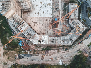 Apartments construction site with yellow crane, Flatley, Saint Petersburg, Russia.