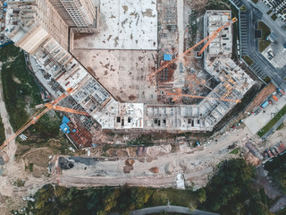 Apartments construction site with yellow crane, Flatley, Saint Petersburg, Russia.