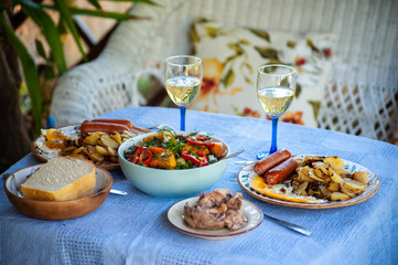 Dinner served on blue rustic tablecloth