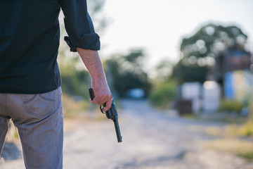 criminal with gun replica about to commit a crime