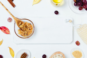 Ingredients for body scrub of brown sugar with grape and  oil, eco bio friendly cosmetic for skin care.