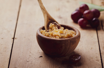 Ingredients for body scrub of brown sugar with grape and  oil, eco bio friendly cosmetic for skin...