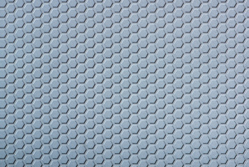 The image of low relief hexagon texture of grey synthetic rubber