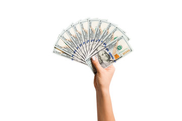 Top view of isolated female hand holding a fan of one hundred dollar bills. Wealth and rich concept