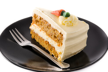 Sweet carrot cake slice on a plate isolated on white background