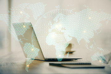 Double exposure of business theme icons and work space with computer background. Concept of success.