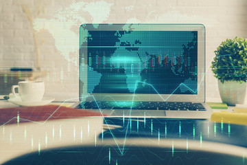Multi exposure of chart and financial info and work space with computer background. Concept of international online trading.