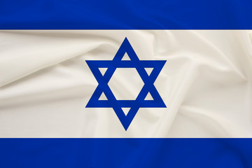 national flag of the country of Israel on gentle silk with wind folds, travel concept, immigration,...