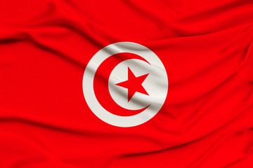 beautiful photo of the national flag of Tunisia on delicate shiny silk with soft draperies, the concept of state power, country life, horizontal, close-up, copy space