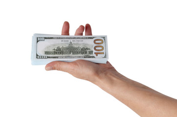 Paper money in a female hand on a white background