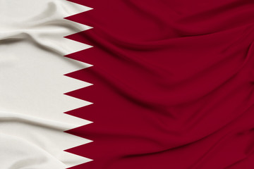 beautiful photo of the Qatar national flag on delicate shiny silk with soft draperies, the concept of state power, country life, horizontal, close-up, copy space
