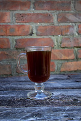 striped coffee with cream and cinnamon
