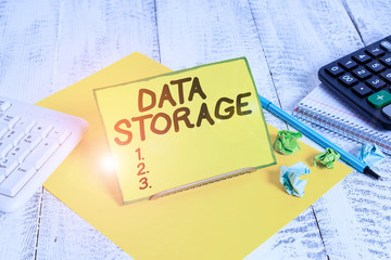 Conceptual hand writing showing Data Storage. Concept meaning the act of archiving data in...