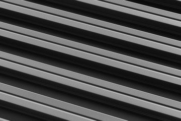 Front view of diagonal stripes on modern gray gate door or wall surface.