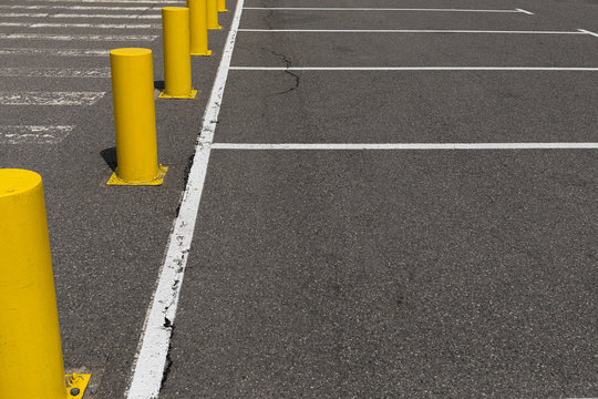 Parking place restrictions on gray aspalt road