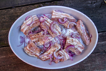 baked pork ribs with onions, apples and sage