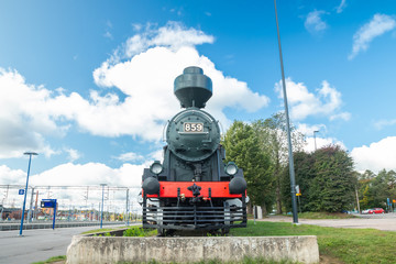 Kouvola, Finland - 22 September, 2019: Old steam locomotive as an exhibit at the Kouvola railway station in Finland.