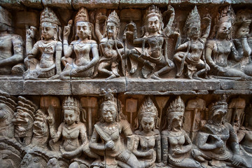 Carved bas-relief design murals on a temple at Angkor Wat complex, Cambodia, closeup
