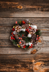 New Year's wreath of spruce and Christmas decorations