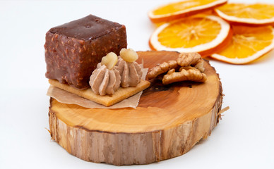 new stylish beautiful chocolate cake on a wooden plate