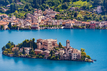 Isola San Giulio (St. Julius Island) in front of the town of Orta on the Orta Lake in the Italian...