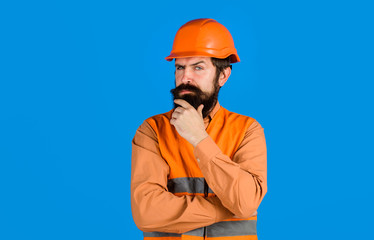 Builder in hard hat. Business, building, industry, technology. Man builder. Bearded man in overalls and construction helmet. Mechanical worker. Industrial worker. Construction worker in hardhat.