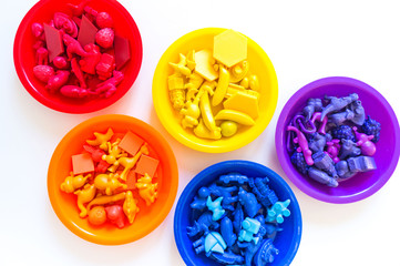 Toys for sorting by color. Bright rainbow.