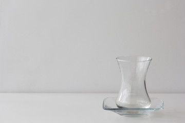 Empty Armudu tea glass on the white background