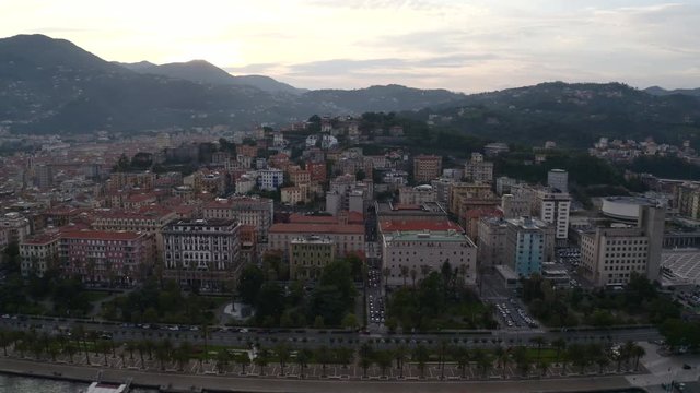 Drone flying over the Italian city of La Spezia from the sea