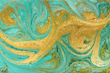 Beautiful gold and turquoise acrylic marble background.