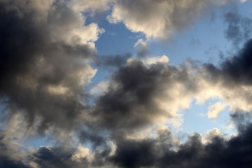 Naklejka na ściany i meble daytime blue cloudy sky with gray little party