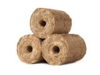 fuel briquettes of straw  isolated on a white background