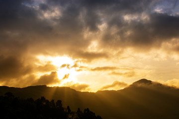Sunrise Over a Mountain at Munnar , Kerala, India