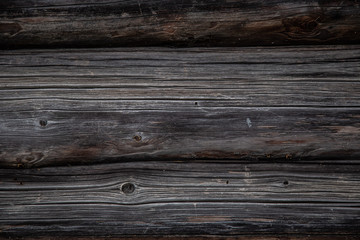 Wooden blockhouse background, part of the wall of the old house from the blockhouse. Wooden blockhouse vintage.