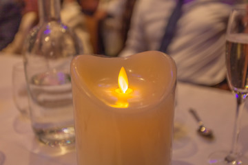 Fake candle over a restaurant table