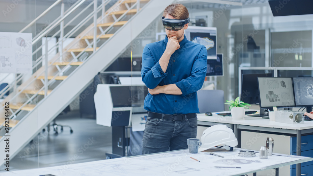 Aufkleber Engineering Software Developer Wearing Virtual Reality Headset Uses Gestures to Interact with Augmented Reality while Designing Industrial Engine Model in Modern Facility. AR Mock-up Concept