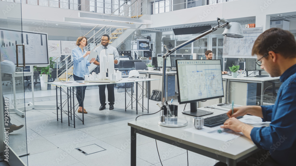 Poster in architectural bureau: team of architects and engineers working on a building complex prototype pr