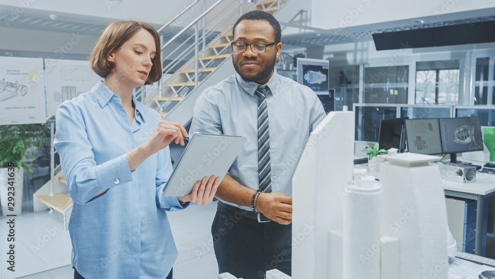 Poster in architectural bureau: architect and engineer talking, working on a building complex prototype pro