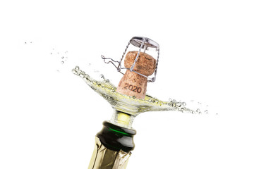 A cork splash with champagne or sparkling wine for the new year 2020