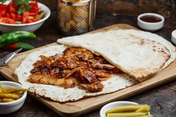 Chicken kebab slices served in the lavash wrap