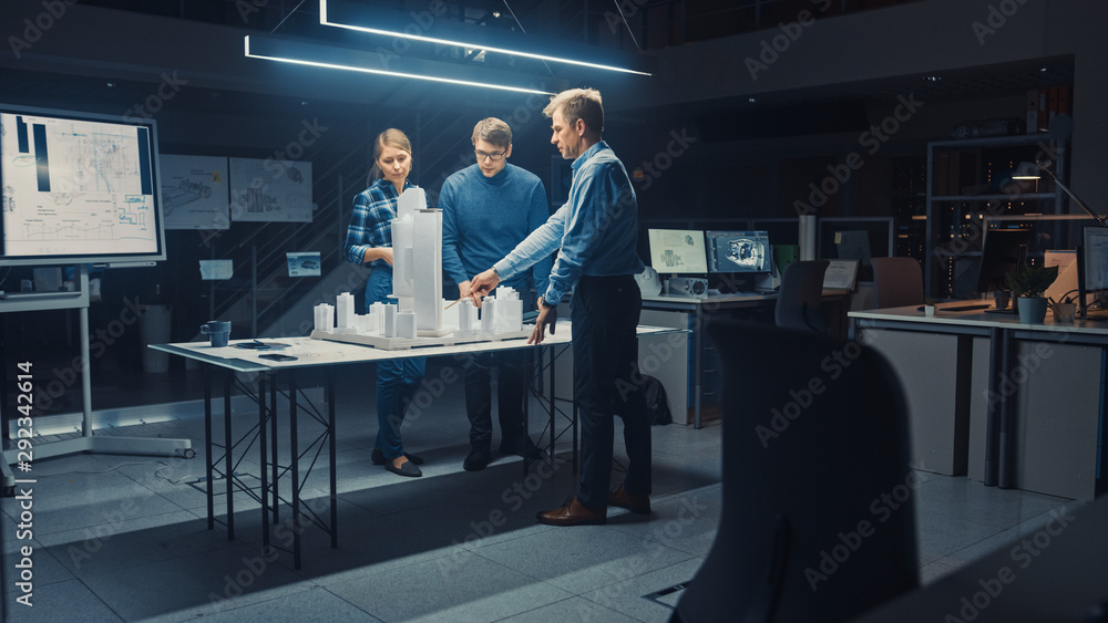 Poster in the creative architectural agency two professional designers talk with chief project engineer, th