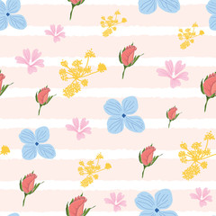 Seamless pattern of small-scale flowers on pink striped background