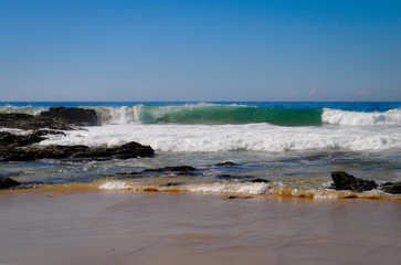 Fototapeta na wymiar Beach to sea view, with waves breaking on the beach, North Valla Beach, NSW, Australia